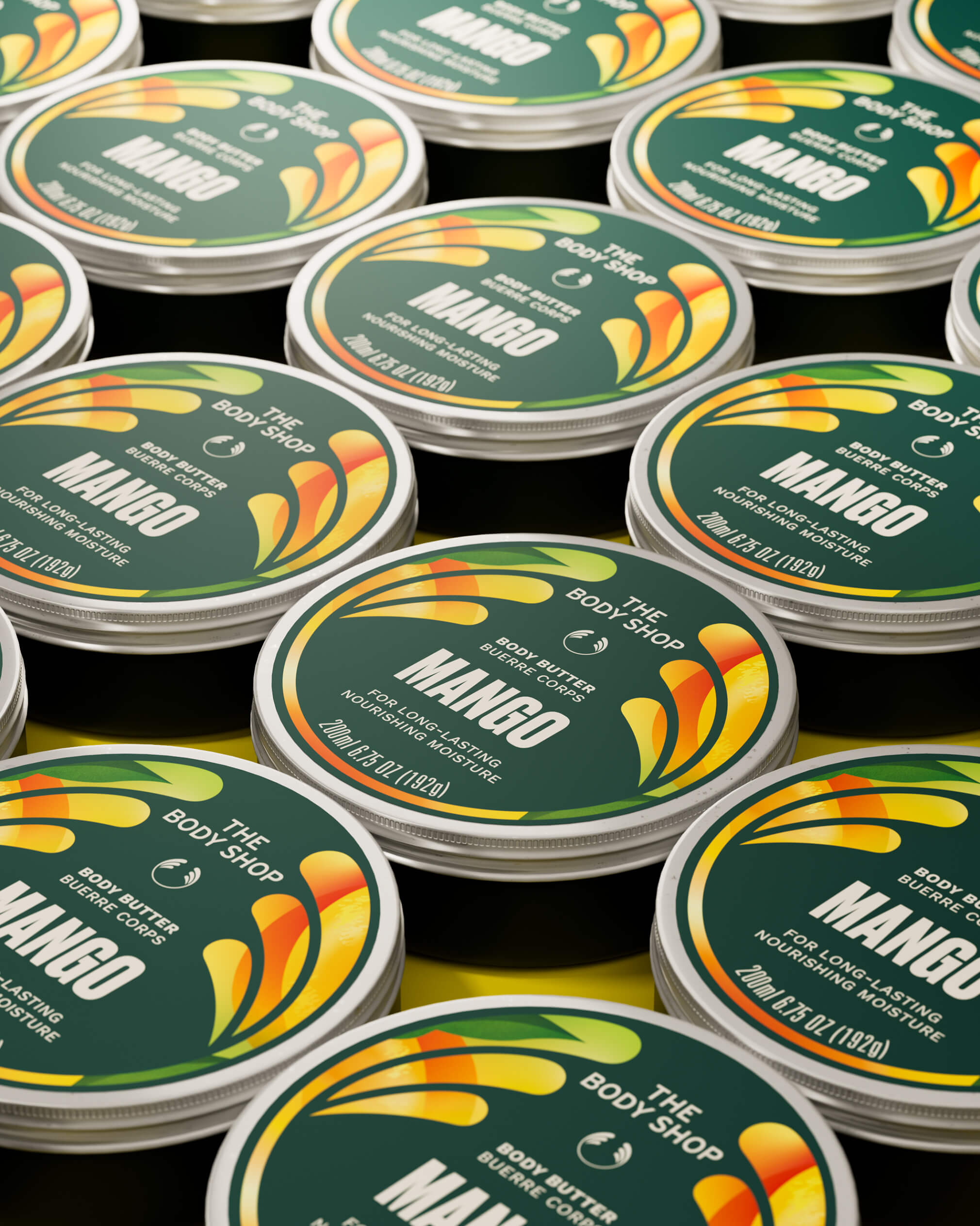 Le couvercle mangue conserve le fond vert et la hiérarchie typographique de la gamme.