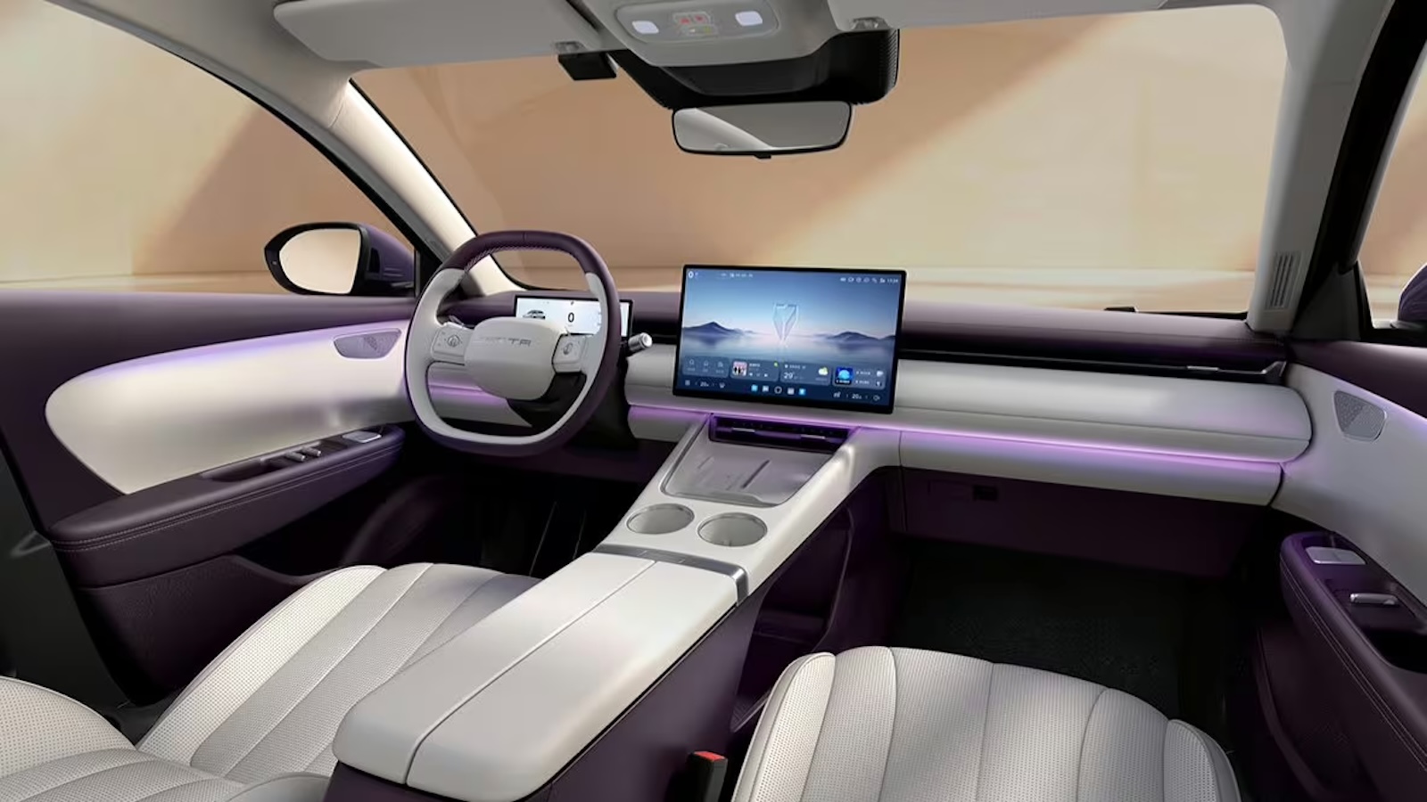 Intérieur de la Jetta M6 avec grand écran central, sièges clairs et éclairage violet